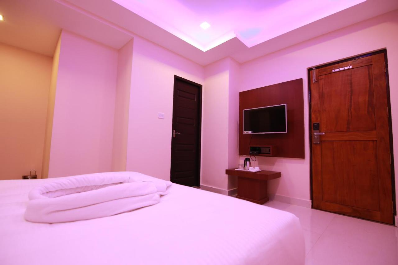 Hotel Apple Suites Bangalore Exterior foto
